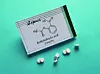 Structural chemical formula of aspirin molecule with pills and t
