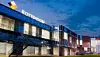 Fassade von Rottendorf Pharma bei Nacht; Manufacturing Execution System, MES, Factorytalk Pharmasuite, Rockwell Automation,
