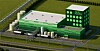 Grün-weiße Industrieanlage mit Gebäuden, Rohrleitungen und leuchtendem Schild auf eingezäuntem Gelände.